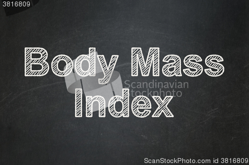 Image of Health concept: Body Mass Index on chalkboard background