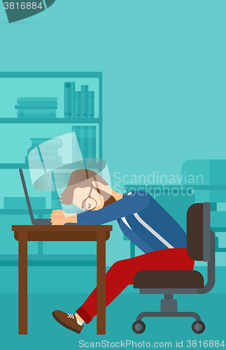 Image of Man sleeping on workplace.