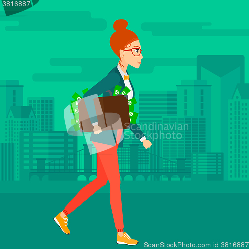 Image of Woman with suitcase full of money.