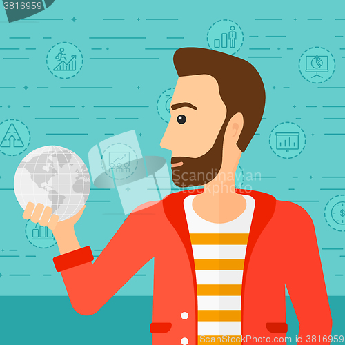 Image of Man holding globe.
