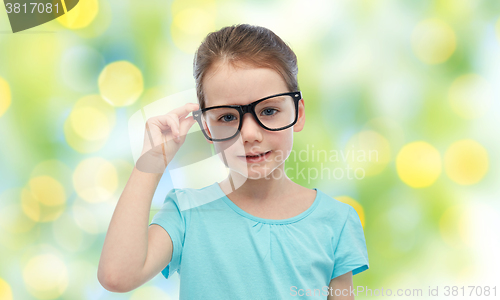 Image of happy little girl in eyeglasses