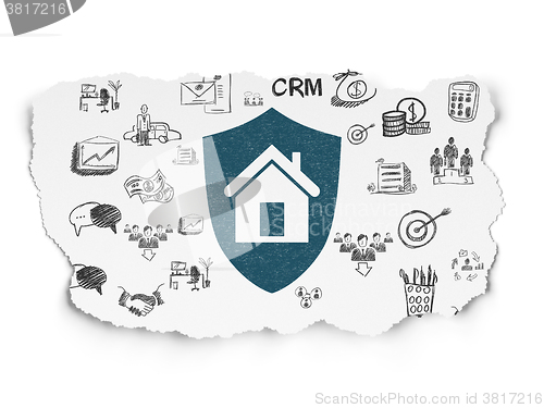Image of Business concept: Shield on Torn Paper background