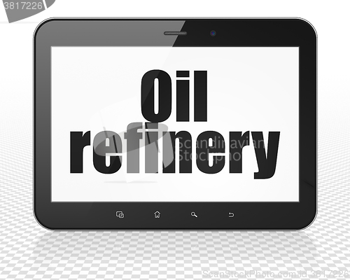 Image of Manufacuring concept: Tablet Pc Computer with Oil Refinery on display