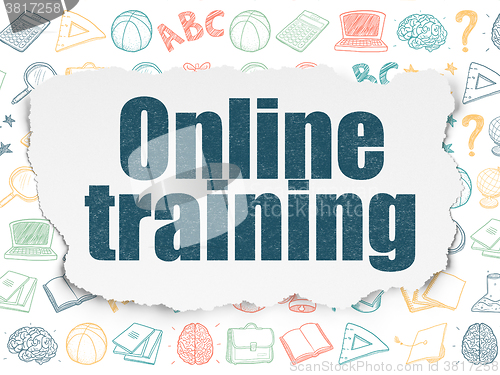 Image of Learning concept: Online Training on Torn Paper background