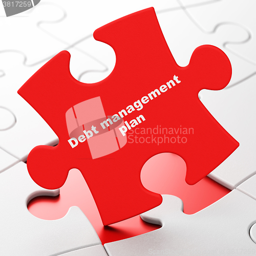 Image of Business concept: Debt Management Plan on puzzle background