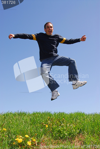 Image of Man jump happy