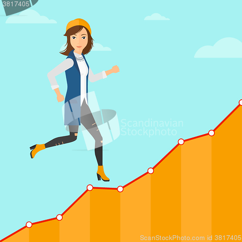 Image of Business woman walking upstairs.