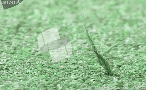 Image of Broken fiber in carpet texture close-up