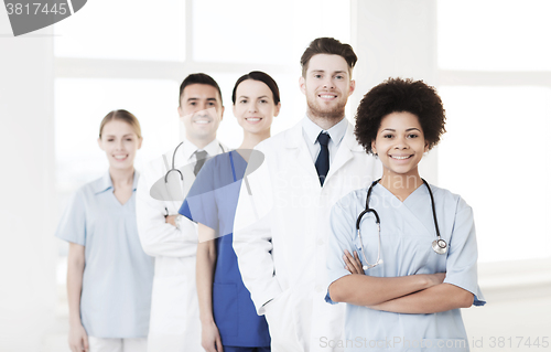 Image of group of happy doctors at hospital