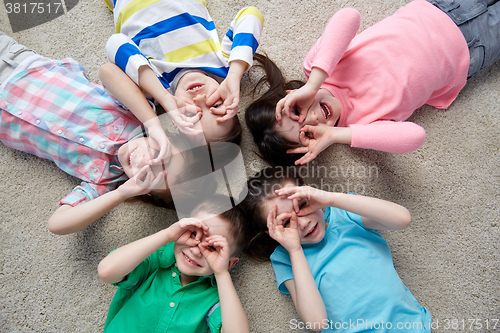 Image of happy children making faces and having fun
