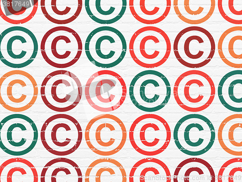 Image of Law concept: Copyright icons on wall background