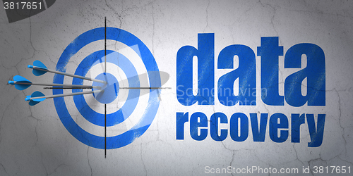 Image of Data concept: target and Data Recovery on wall background