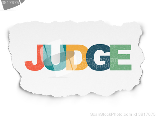 Image of Law concept: Judge on Torn Paper background