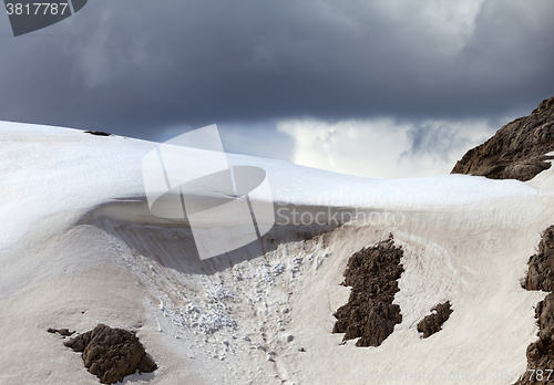 Image of Snow cornice in mountains. Close-up view.