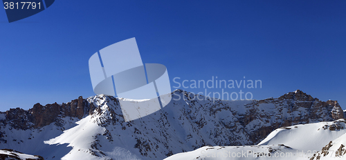 Image of Panoramic view on snowy mountains in morning