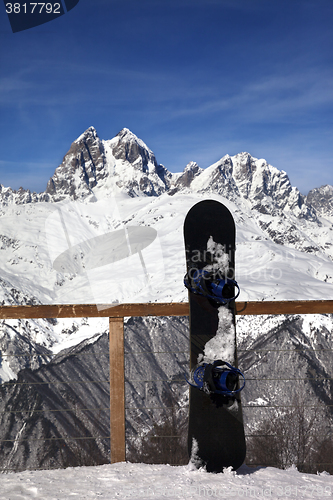 Image of Snowboards in outdoor cafe at ski resort