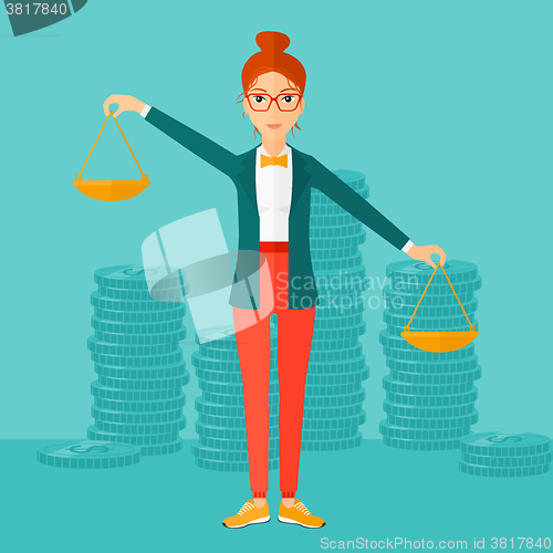 Image of Business woman with scales.