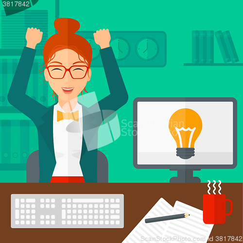 Image of Woman working at office.