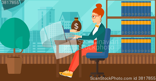 Image of Business woman working in office.