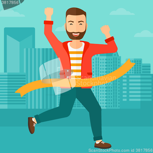 Image of Businessman crossing finish line.