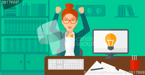 Image of Woman working at office.