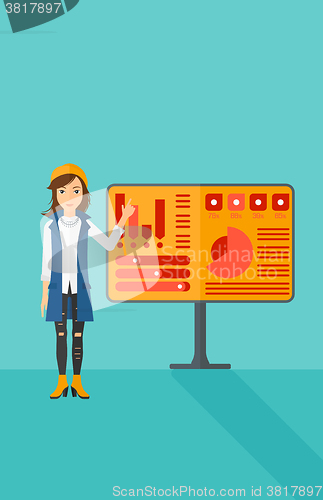 Image of Woman presenting report.