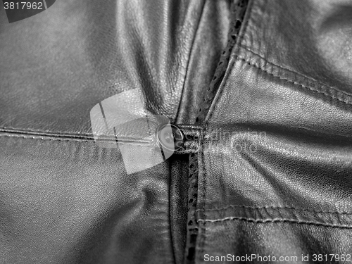 Image of black leather coat detail