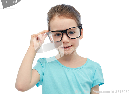 Image of happy little girl in eyeglasses