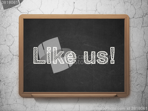 Image of Social network concept: Like us! on chalkboard background