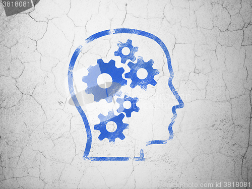 Image of Data concept: Head With Gears on wall background