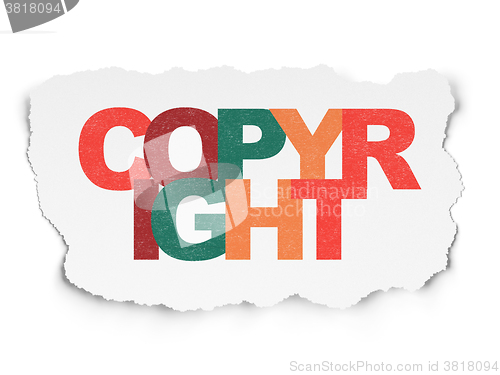 Image of Law concept: Copyright on Torn Paper background