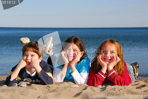 Image of Three children on a beach