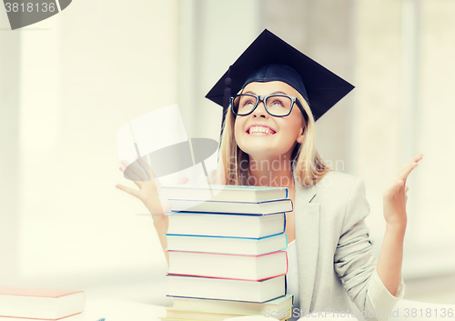 Image of happy student in graduation cap