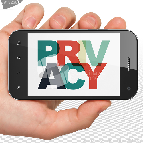 Image of Security concept: Hand Holding Smartphone with Privacy on  display