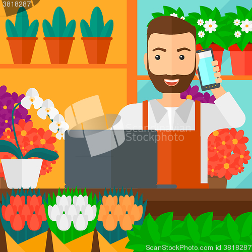 Image of Florist taking order.