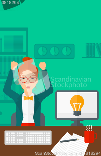 Image of Woman working at office.