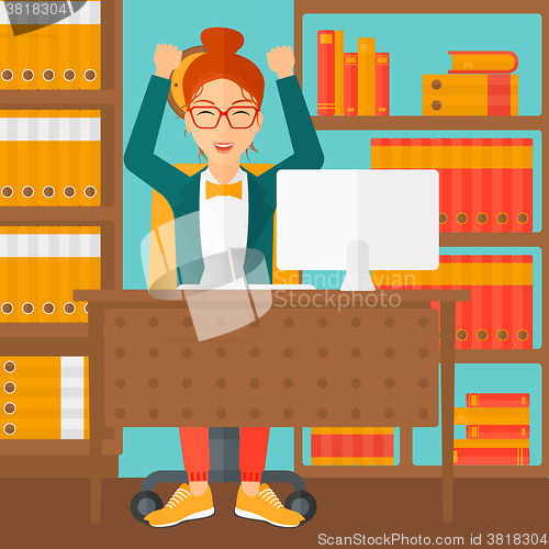 Image of Woman working at office.