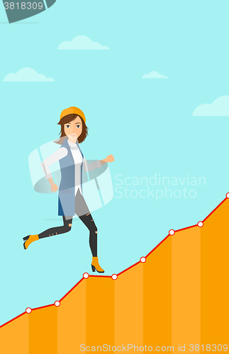 Image of Business woman walking upstairs.