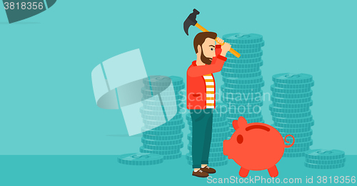 Image of Man breaking piggy bank.