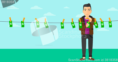 Image of Man loundering money.