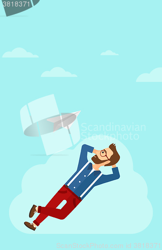 Image of Businessman relaxing on cloud.