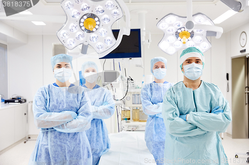 Image of group of surgeons in operating room at hospital