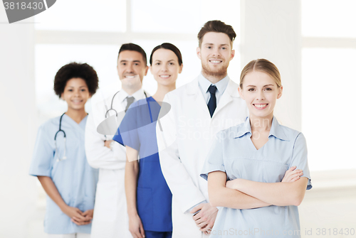 Image of group of doctors and nurses at hospital