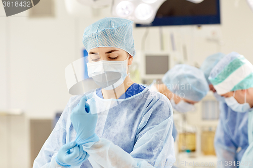 Image of surgeon in operating room at hospital