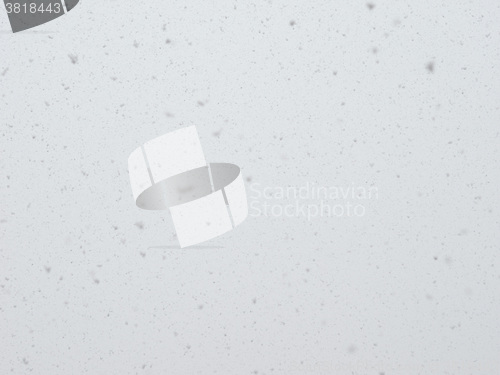 Image of Snow flakes over the sky