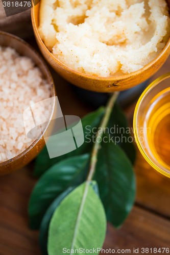 Image of close up of body scrub in wooden bowl