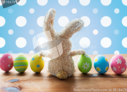 Image of close up of colored easter eggs and bunny