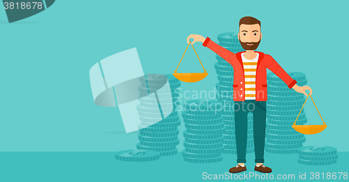 Image of Businessman with scales.