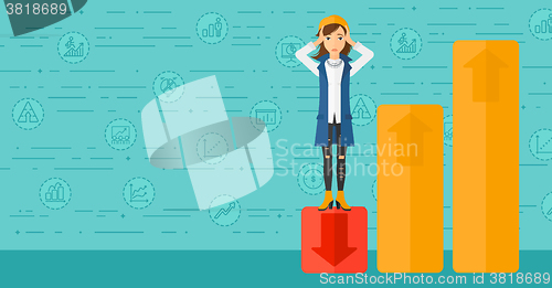 Image of Business woman standing on low graph.