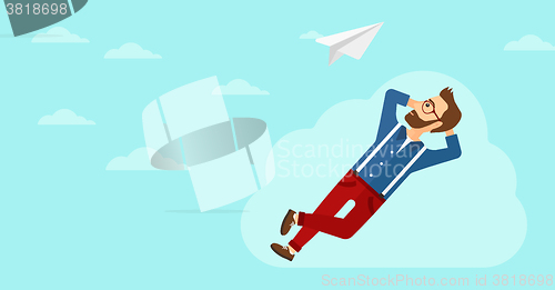 Image of Businessman relaxing on cloud.